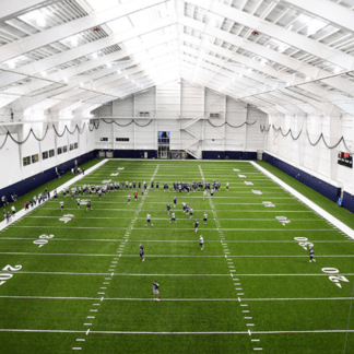 University-of-Connecticut-Mark-R.-Shenkman-Training-Center-with-Players-324x324